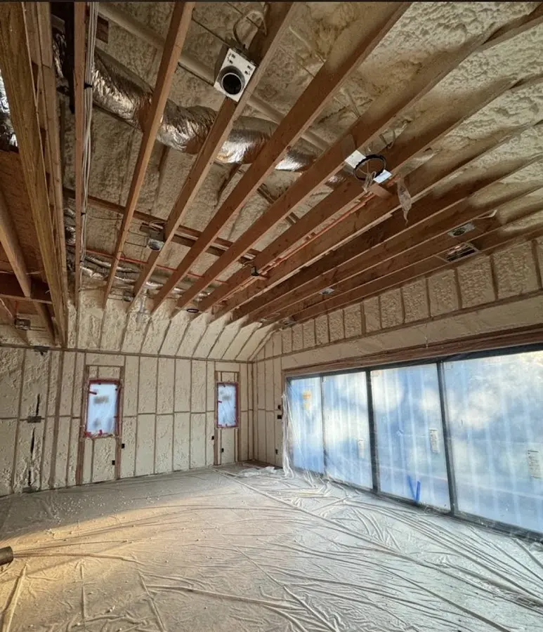 Interior walls and ceiling insulated with spray foam during new construction in Mobile